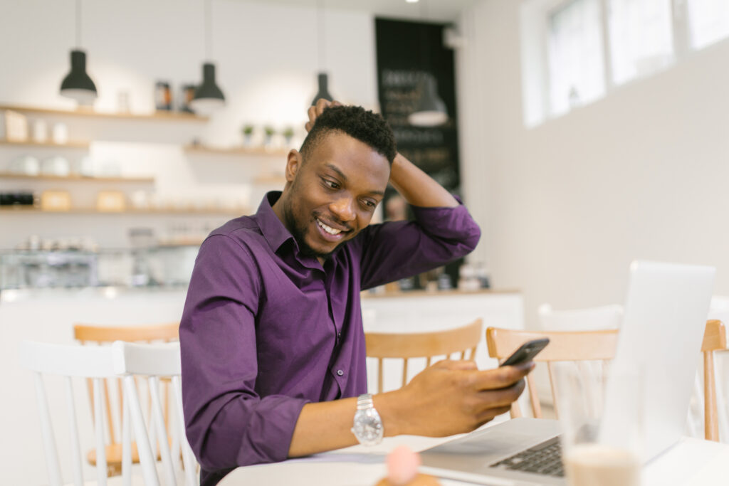 Young freelancer is working from the coffee shop. Video from the same series is available