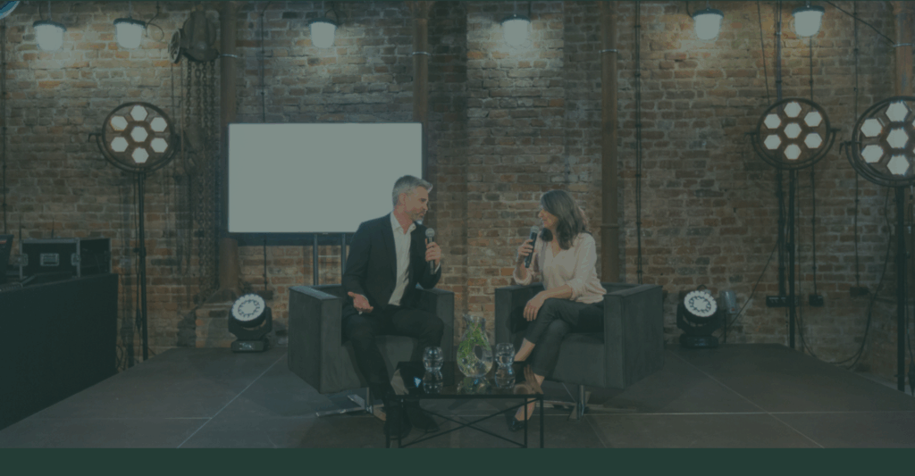 executive interview on a stage in front of an audience